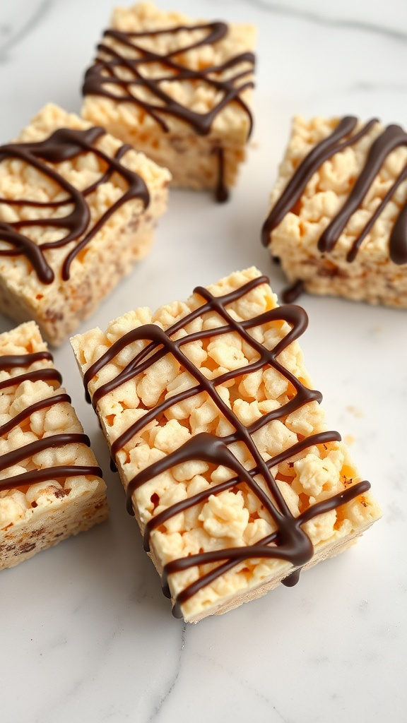 Nutella Swirled Rice Krispie Treats drizzled with chocolate
